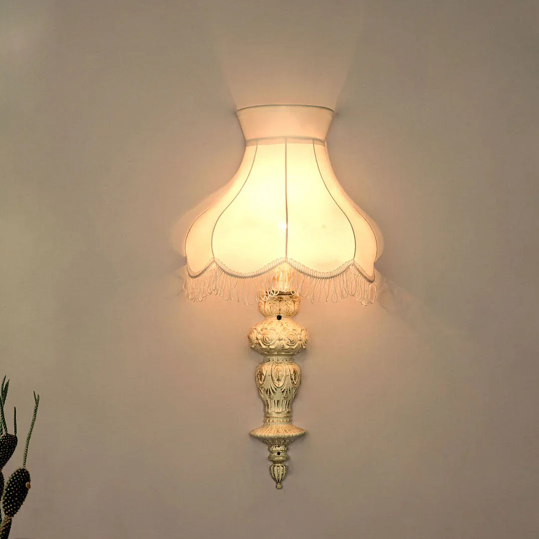 Aluminium Handcrafted Distressed Ornate Pillar Transitional Wall Sconce With Fringed Fabric Shade