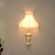 Aluminium Handcrafted Distressed Ornate Pillar Transitional Wall Sconce With Fringed Fabric Shade