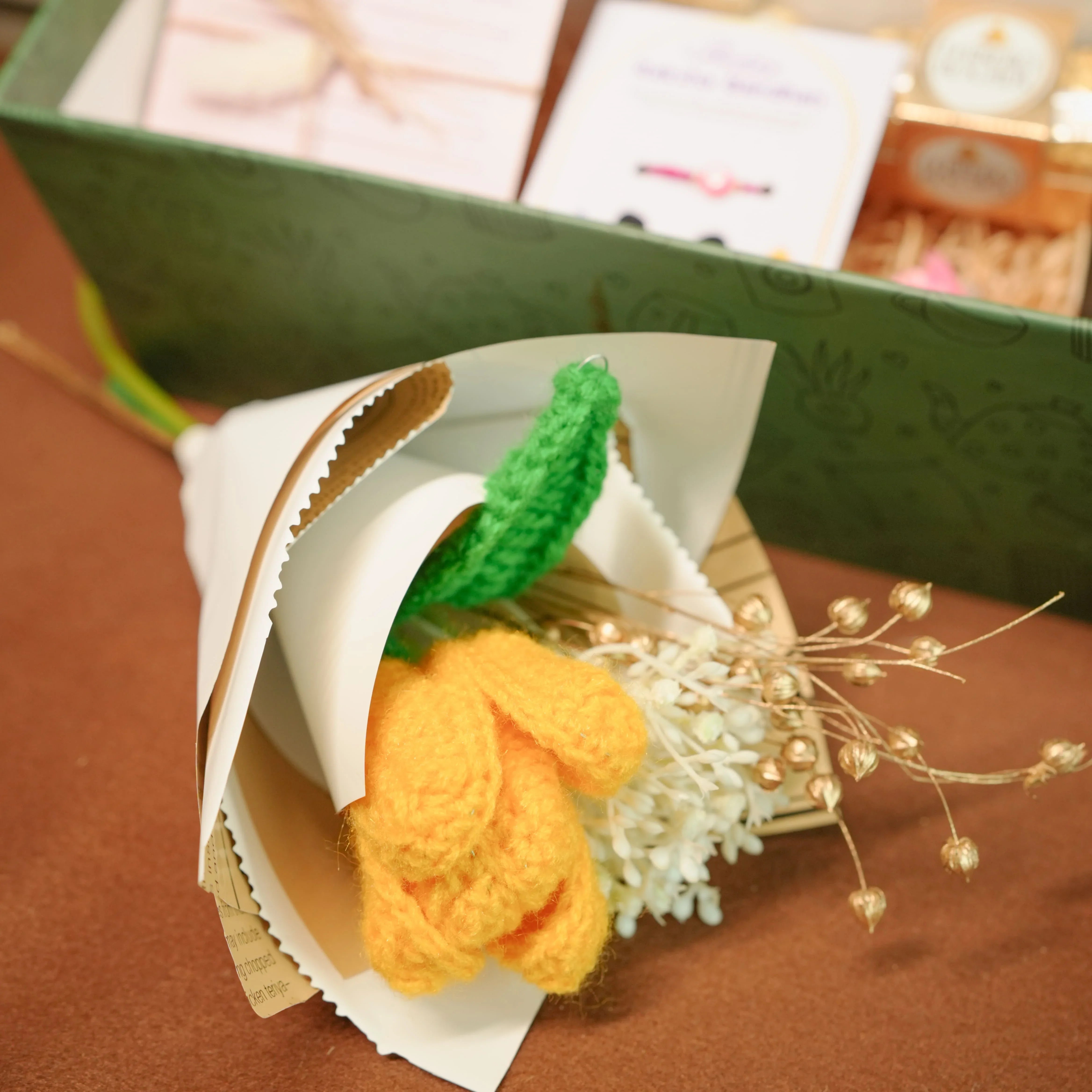 Flower-Themed Rakhi Hamper for Bhai & Bhabhi | Thoughtful Rakhi Gift Set with Candle, Chocolates & Flower Bunch
