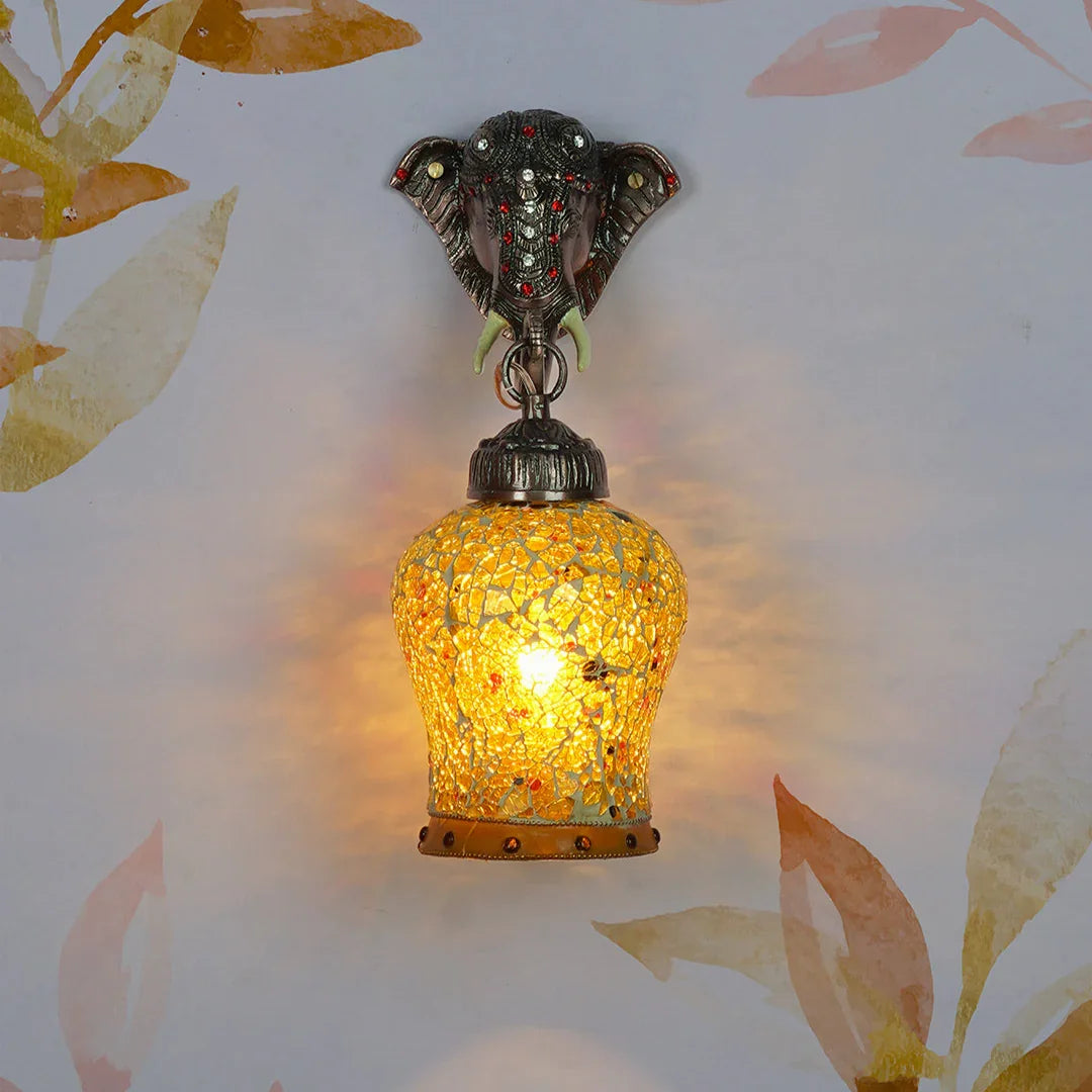 Rustic Cast Aluminium Bronze Elephant Wall Sconce with Amber Yellow Crackle Glass shade