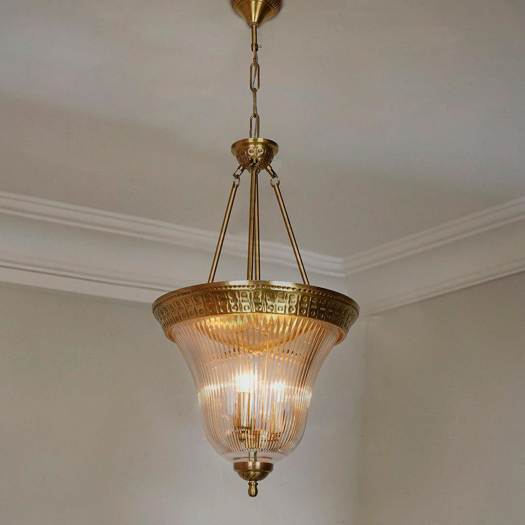 Timeless Elegance: Antique Brass Pendant Light with Unique Cut Glass Enclosure