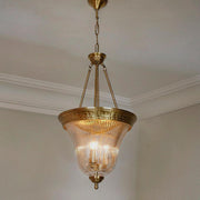 Timeless Elegance: Antique Brass Pendant Light with Unique Cut Glass Enclosure