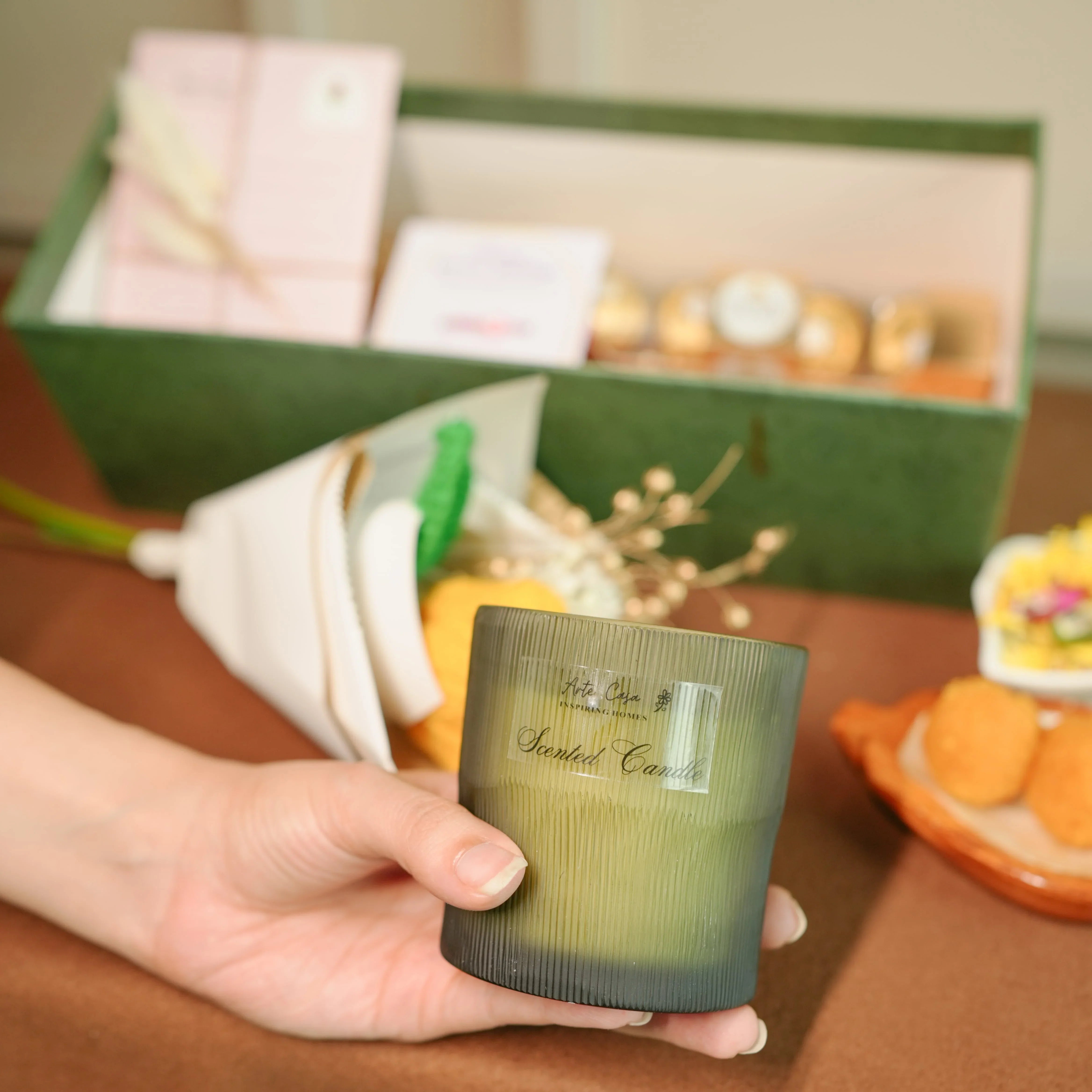 Flower-Themed Rakhi Hamper for Bhai & Bhabhi | Thoughtful Rakhi Gift Set with Candle, Chocolates & Flower Bunch
