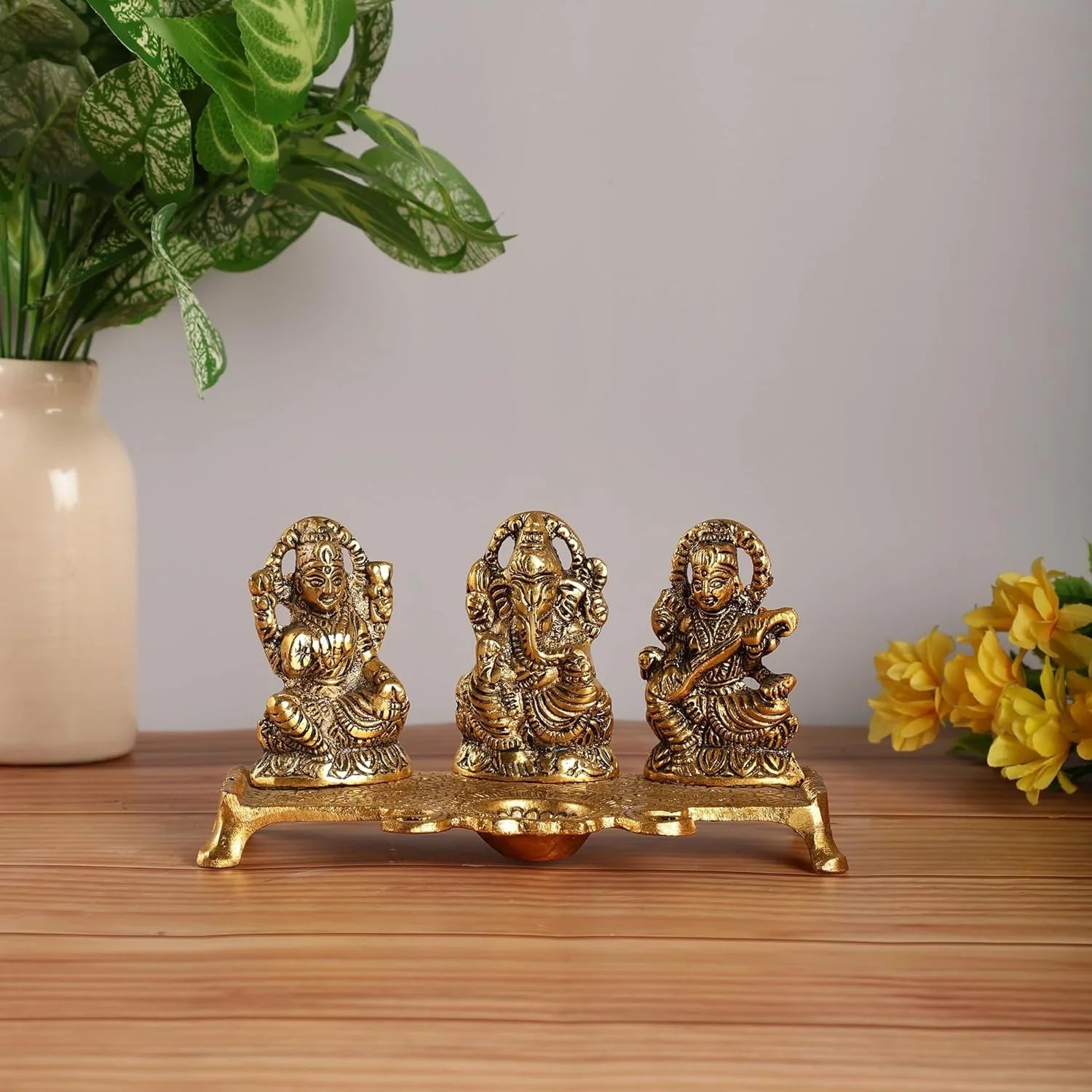 Goddess Laxmi Ganesh Saraswati Idol With Diya