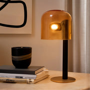 Syra Designer Table Lamp for Living Room | Modern Black & Brass LED Lamp with Amber Glass Dome