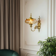 Regal Antique Brass Wall Sconce with Golden Luster Covered Glass Shade
