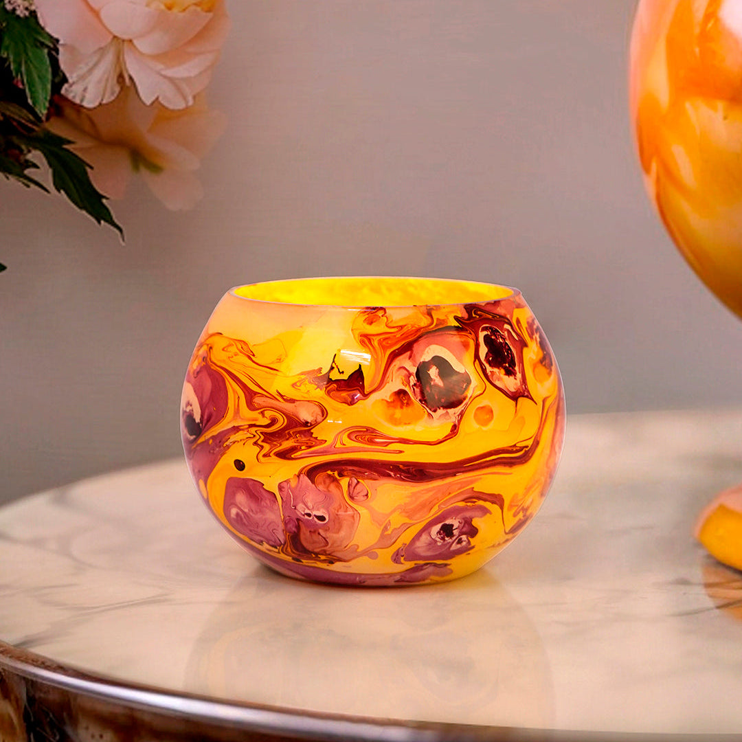 Swirling Sunset: Round Glass Tea Light Holder with Red & Yellow Marble Effect
