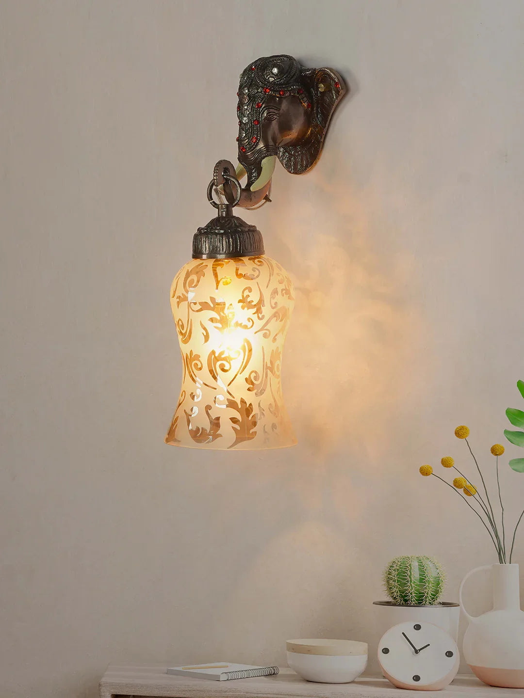 Rustic Cast Aluminium Bronze Elephant Wall Sconce with Amber Yellow Crackle Glass shade