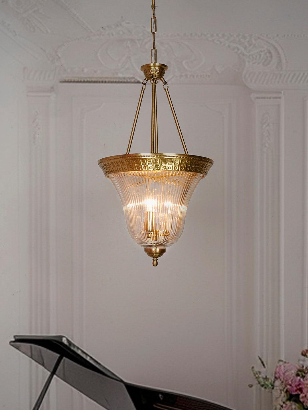 Timeless Elegance: Antique Brass Pendant Light with Unique Cut Glass Enclosure