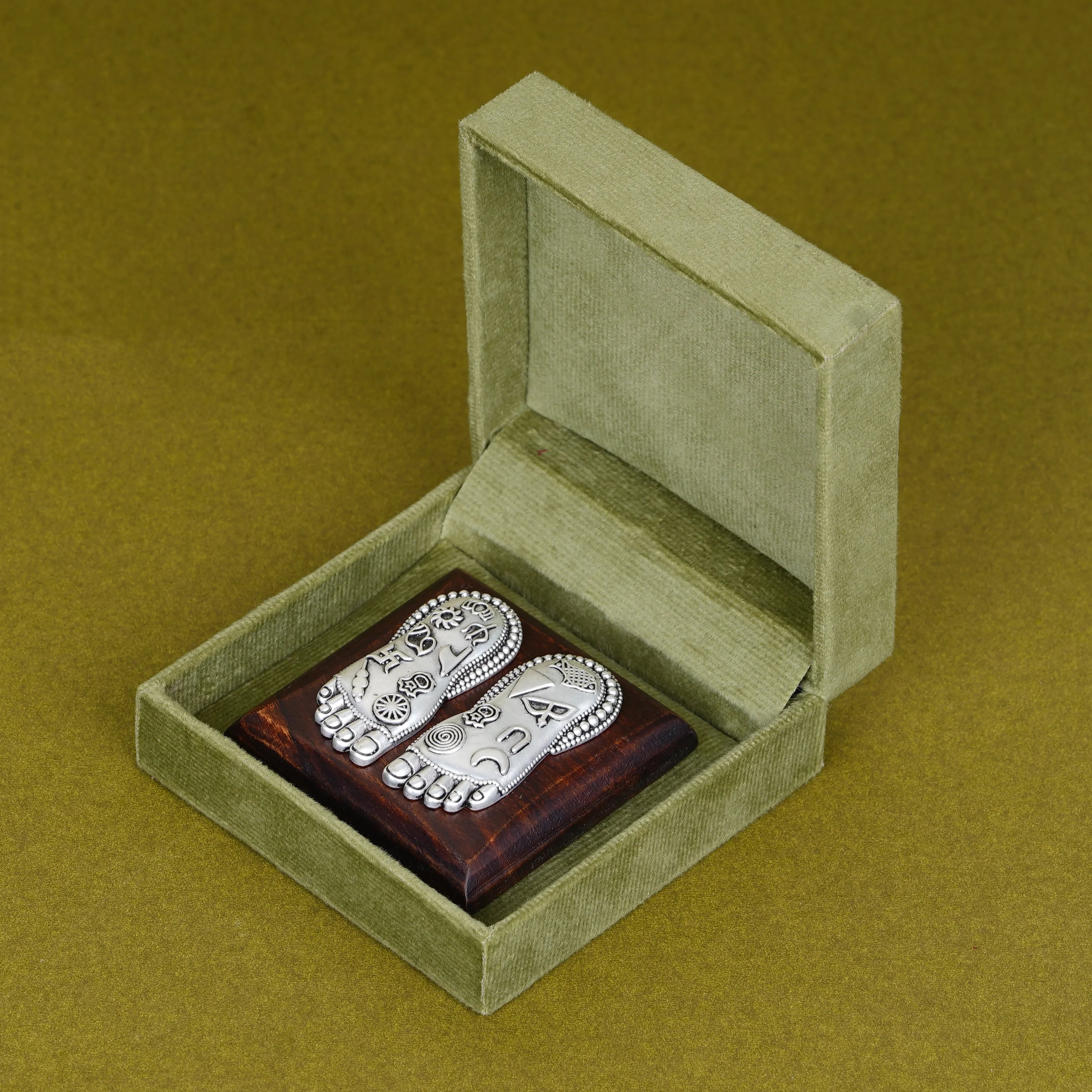 Silver Plated Brass Lakshmi Charan | Sacred Goddess Feet With Ashtamangala Symbols On Wooden Plank