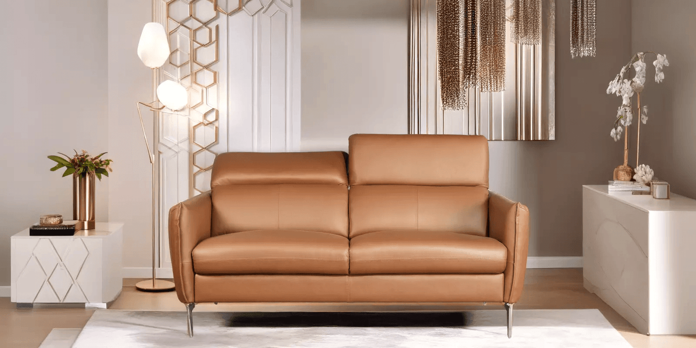 Navona Genuine leather modern sofa with functional headrest In Tan Colour.