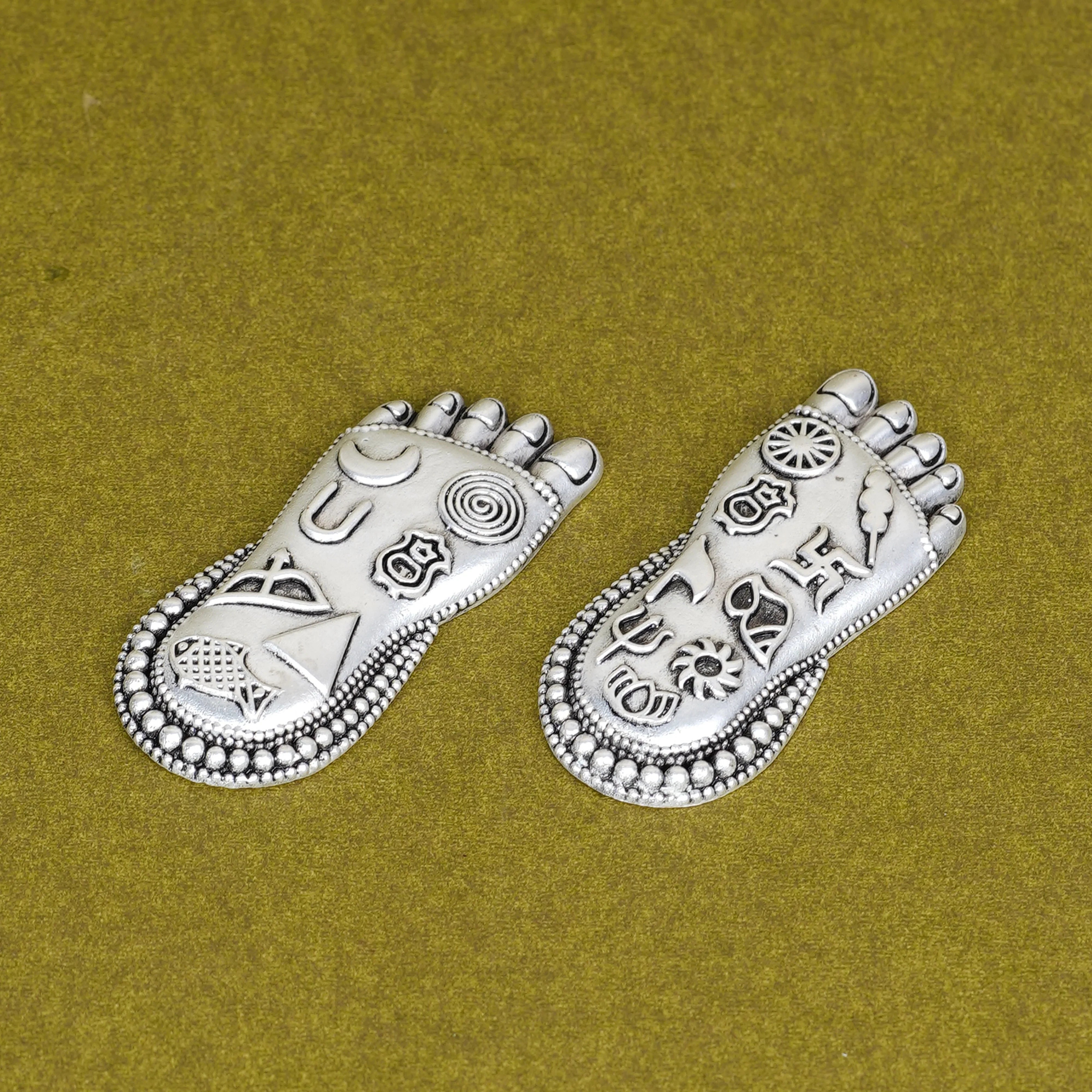 Silver Plated Brass Lakshmi Charan | Sacred Goddess Feet With Ashtamangala Symbols On Wooden Plank