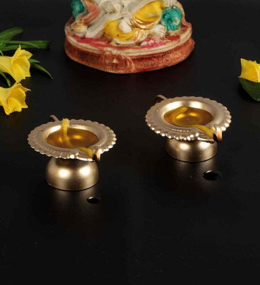 Buy Diya & Diya Stand - Metallic Hath Diya With Handle For Pooja Set Of 2 | Golden Tealight Holder by Amaya Decors on IKIRU online store