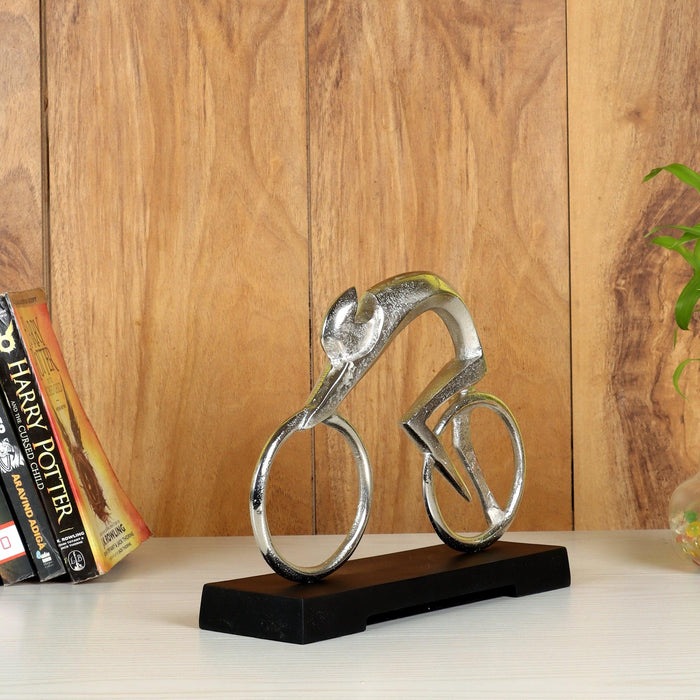 Buy Showpieces & Collectibles - Bicycle Man Aluminium Statue | Decorative Showpiece For Table Decor & Gifting by De Maison Decor on IKIRU online store