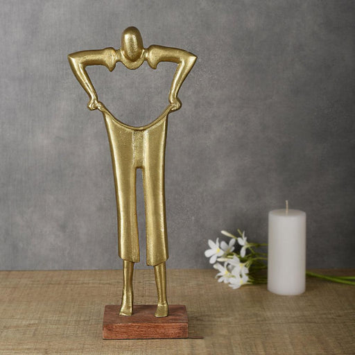 Buy Showpieces & Collectibles - Gold Aluminum & Wood Pulling Pant Sculpture For Tableware & Home Decor by Manor House on IKIRU online store
