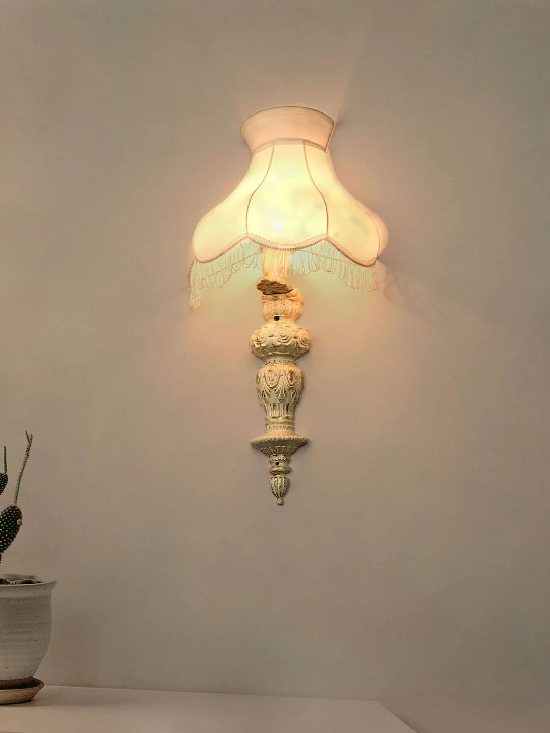 Aluminium Handcrafted Distressed Ornate Pillar Transitional Wall Sconce With Fringed Fabric Shade