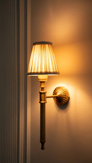 Brass Antique Finish Corrugated Wall Lamp with Off White Pleated Shade