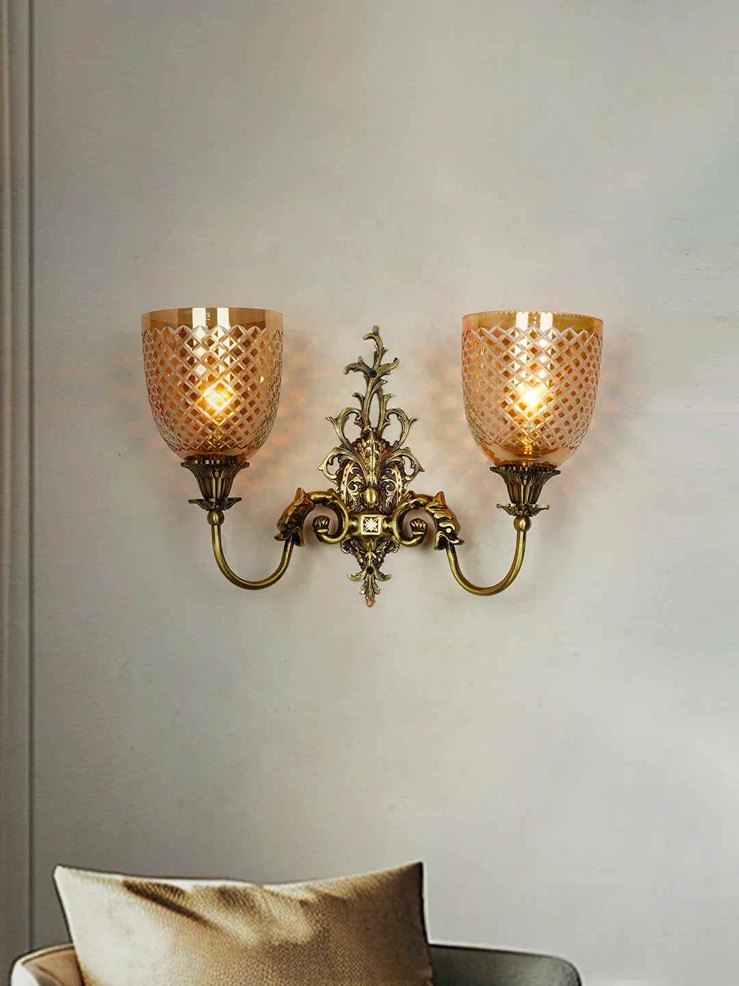 Mythical Majesty: Antique Brass Fish Double Sconce with Luster Glass
