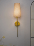 Savoy Long Arm Antique Gold Wall Sconce with Beige Fabric Shade.