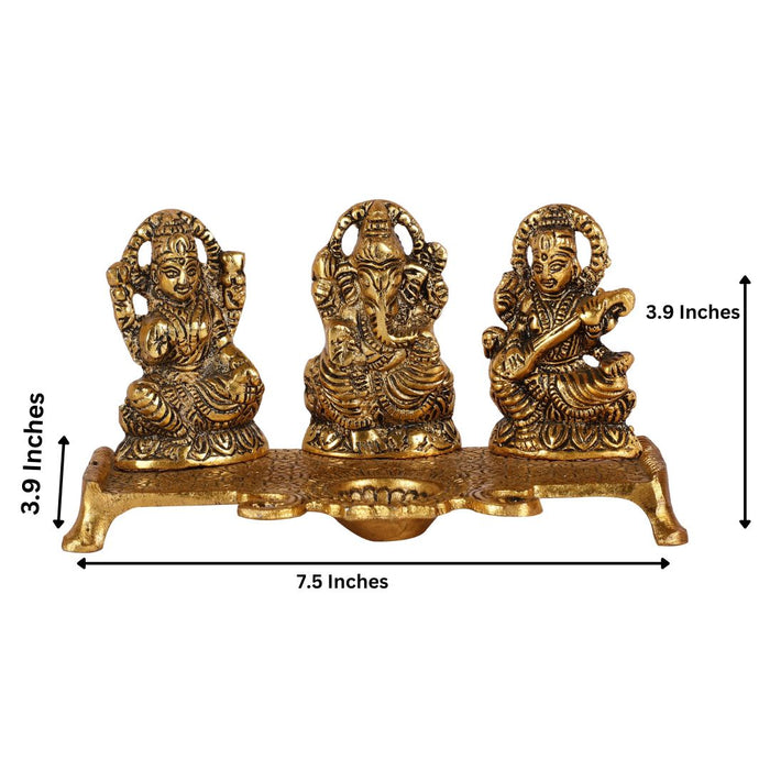 Goddess Laxmi Ganesh Saraswati Idol With Diya