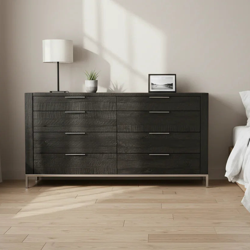 Grapple matt black chest of drawers in modern bedroom with lamp and decor