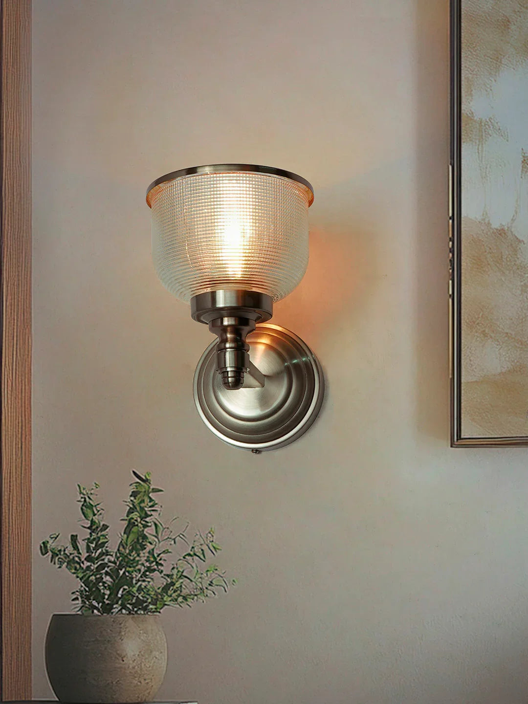 Rose Gold Wall Sconce with Rimmed Glass Shade