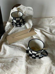 The Black Checkered Cup & Saucer | Black & White