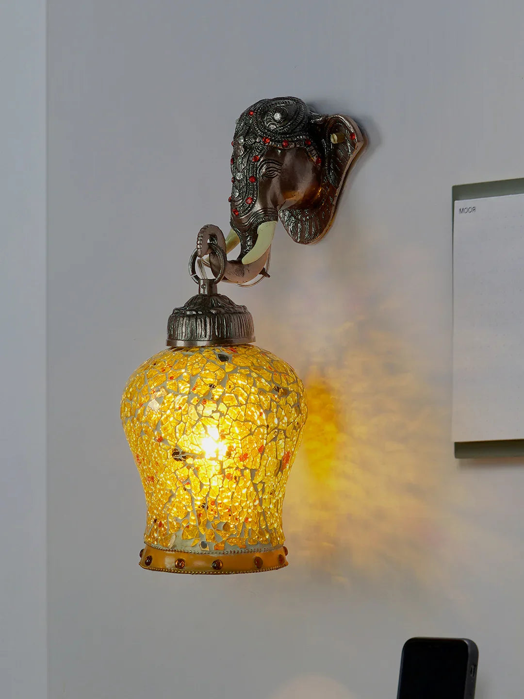 Rustic Cast Aluminium Bronze Elephant Wall Sconce with Amber Yellow Crackle Glass shade