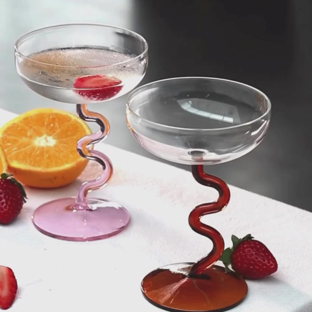 Load video: Swirl Cocktail Glasses | Stylish Drinkware for Juice &amp; Water