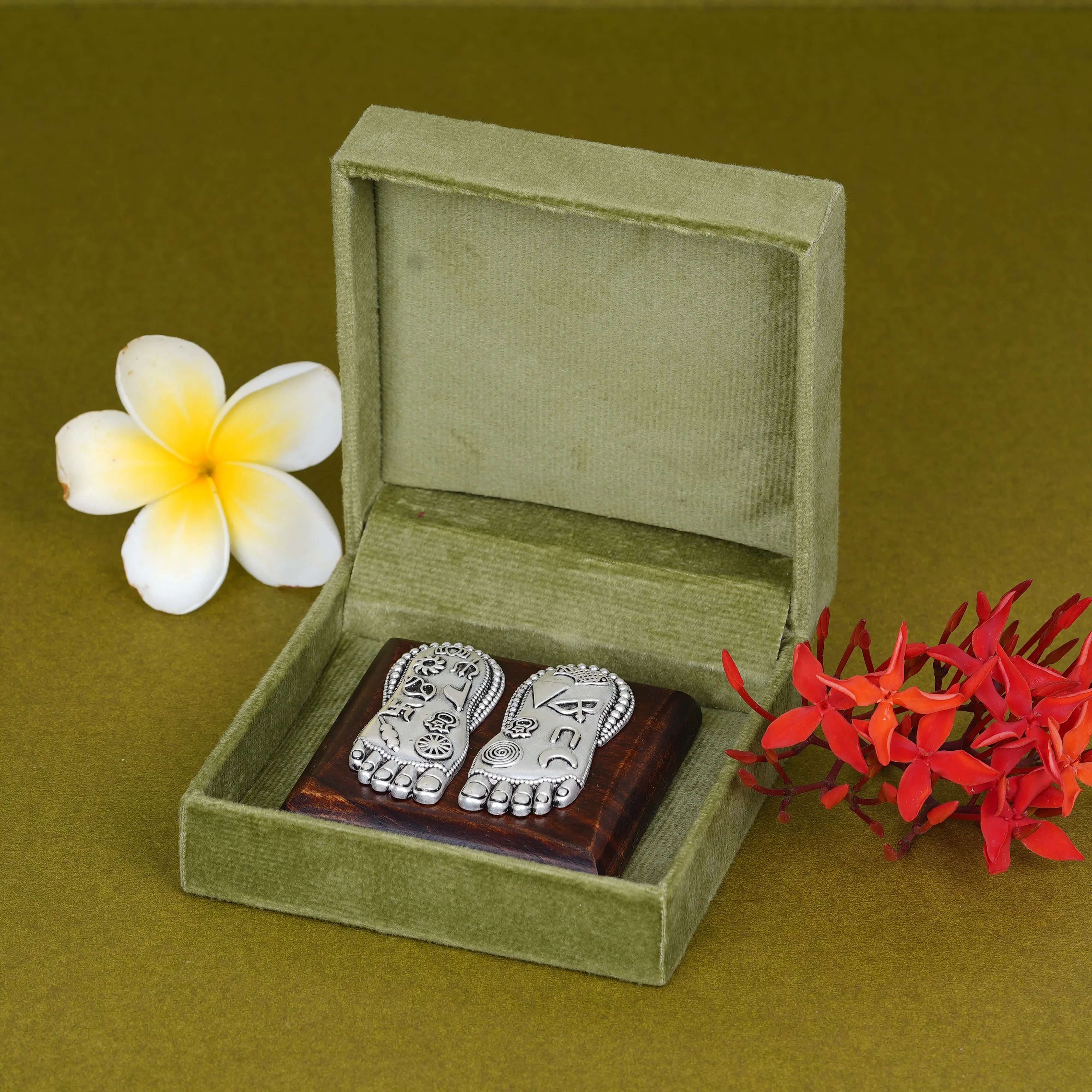Silver Plated Brass Lakshmi Charan | Sacred Goddess Feet With Ashtamangala Symbols On Wooden Plank
