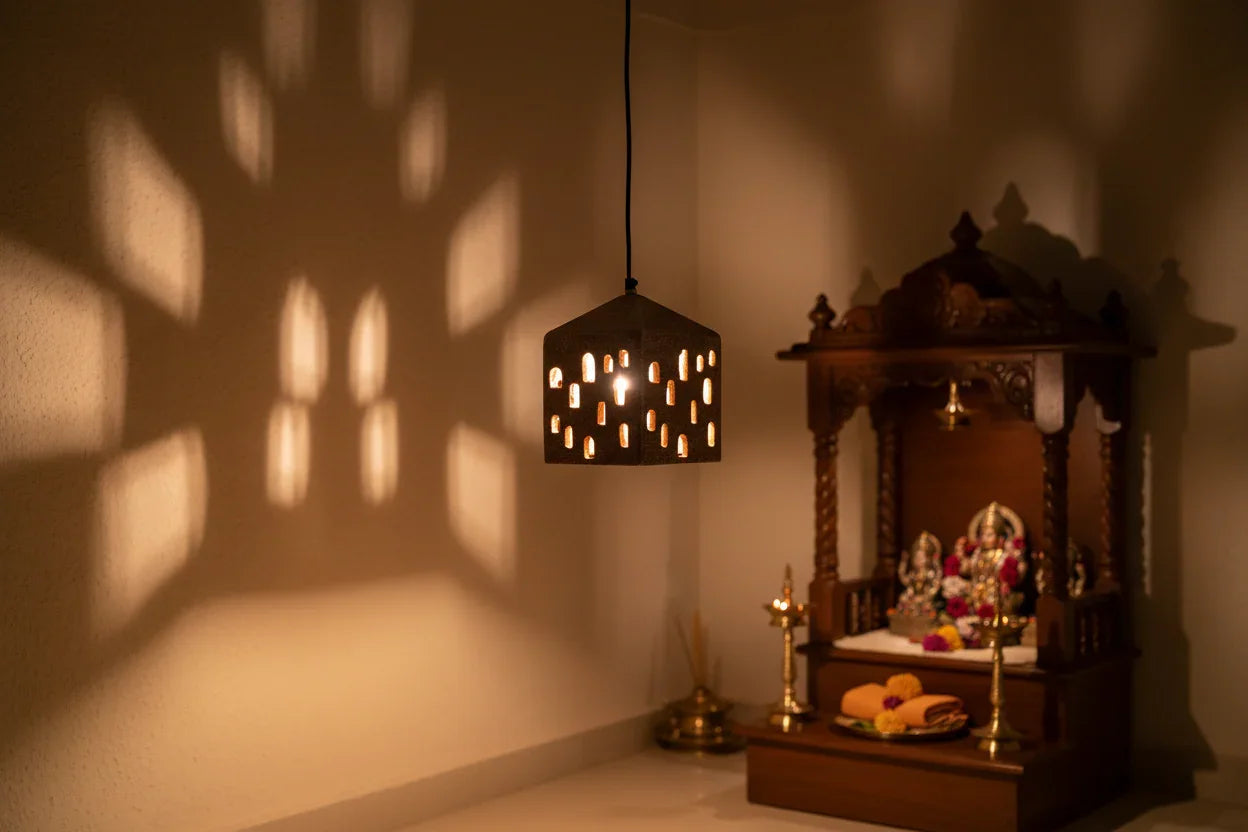 Ceramic lantern shaped like a house with a textured surface and cut-out windows, hanging against a dark background.