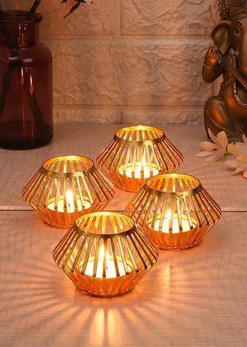 Buy Candle Stand - Gold Plated Unique Tealight Holder Set Of 4 | Metal Candle Stand by Amaya Decors on IKIRU online store