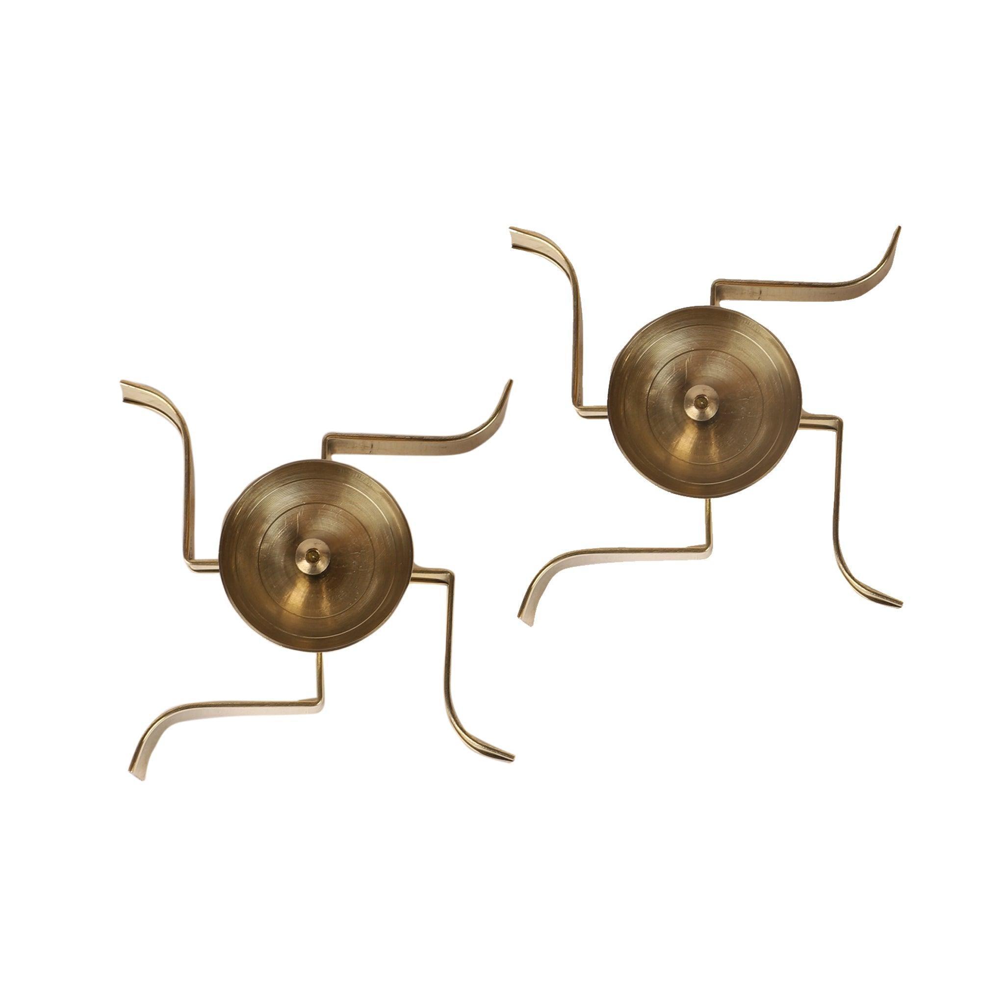 Buy Diya & Diya Stand - Golden Sleeping Satiya Diya Set Of 2 | Brass Swastik Tealight Holder by Amaya Decors on IKIRU online store