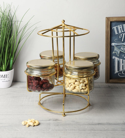 https://ikiru.in/cdn/shop/products/buy-platter-golden-rotating-round-container-stand-or-dry-fruit-serving-platter-for-kitchen-by-amaya-decors-on-ikiru-online-store-1_512x564.jpg?v=1693559947